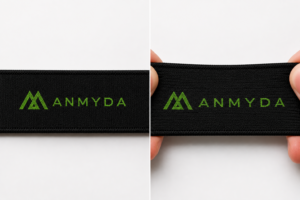 Small woven logo on a sports bra strap shown relaxed and stretched