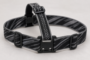 Headlamp top and side straps using different width elastic webbing