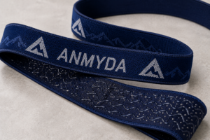 Thin elastic headlamp strap webbing with woven jacquard logo and silicone grip
