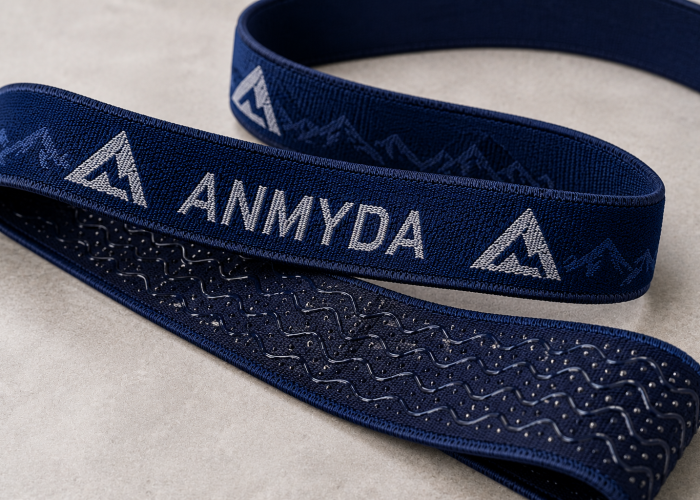 Thin elastic headlamp strap webbing with woven jacquard logo and silicone grip